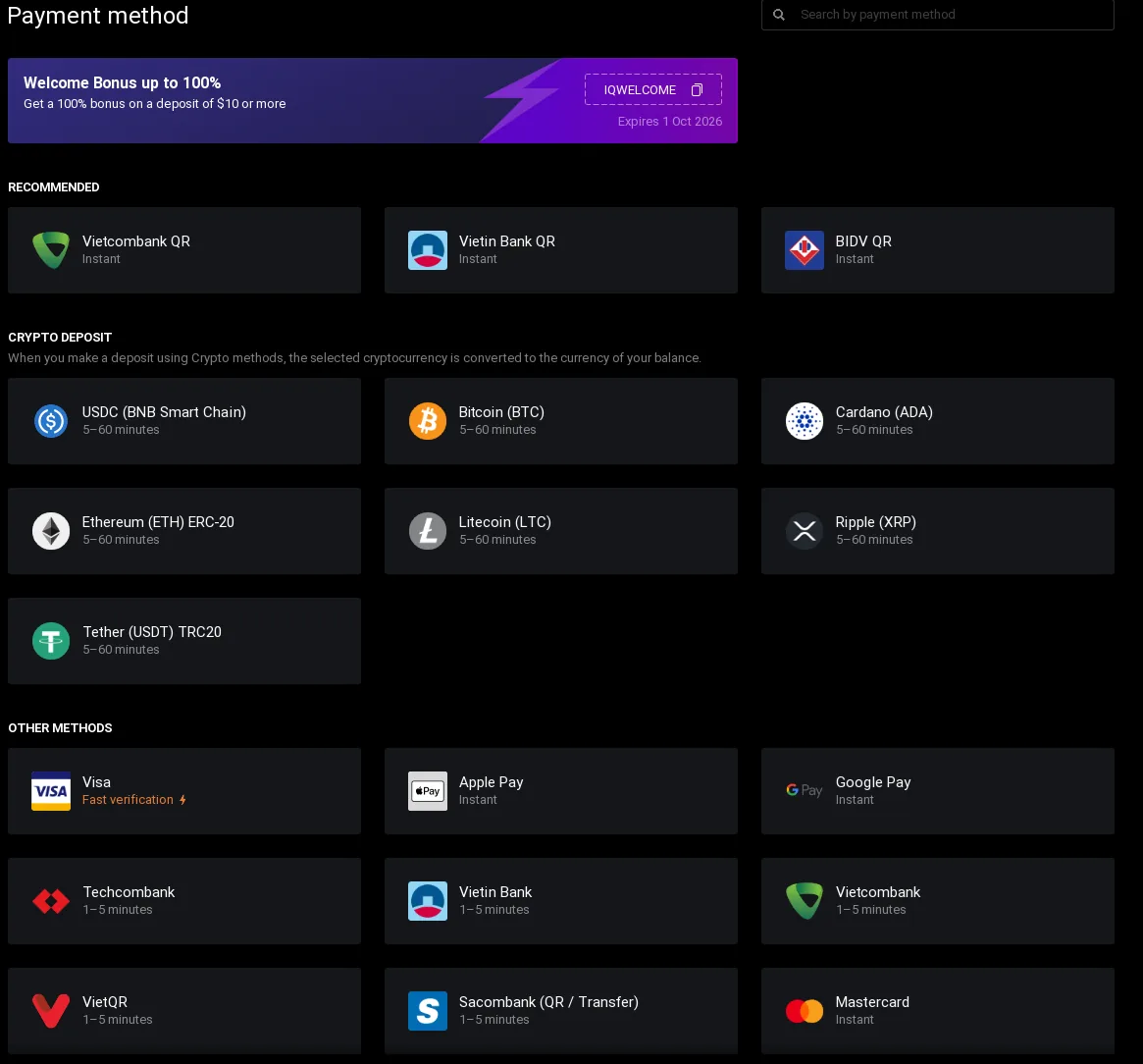 IQ Option payment method screen with the IQWELCOME bonus banner, recommended local methods, crypto deposits and cards